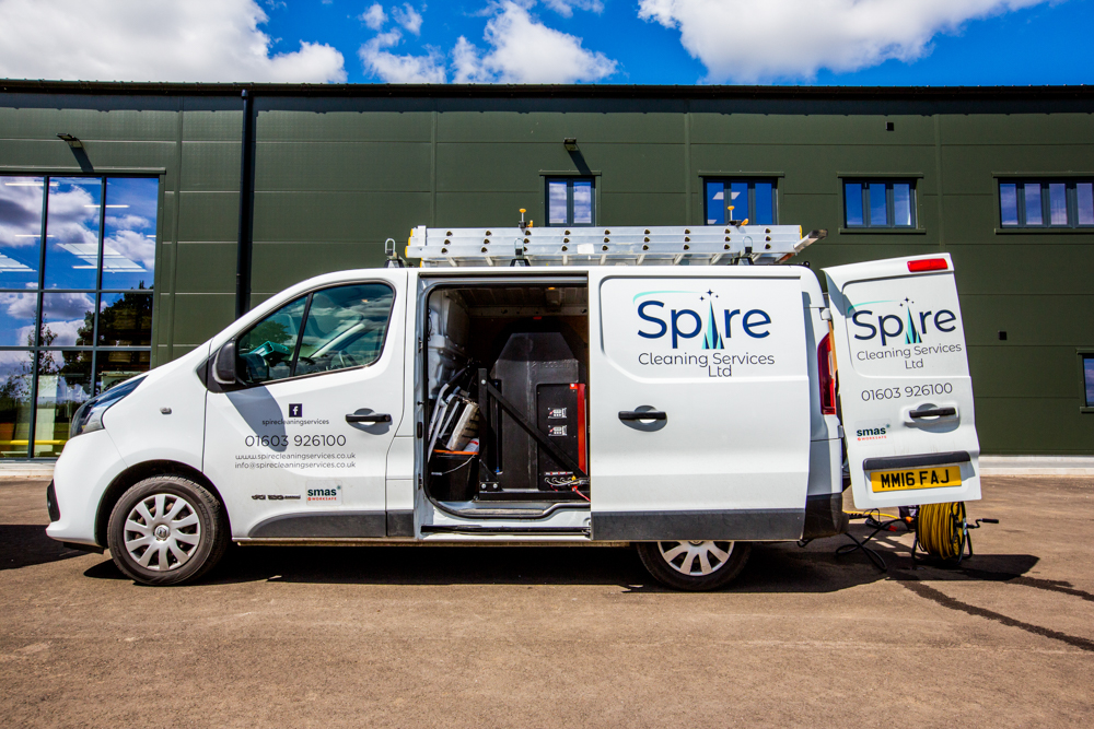 white-spire-cleaning-services-van-with-equipment