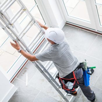 spire-cleaning-on-a-ladder-home-cleaning